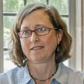 head shot of woman - Laura Micham